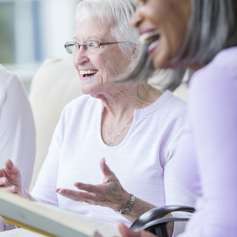 Cheerful senior woman during book club