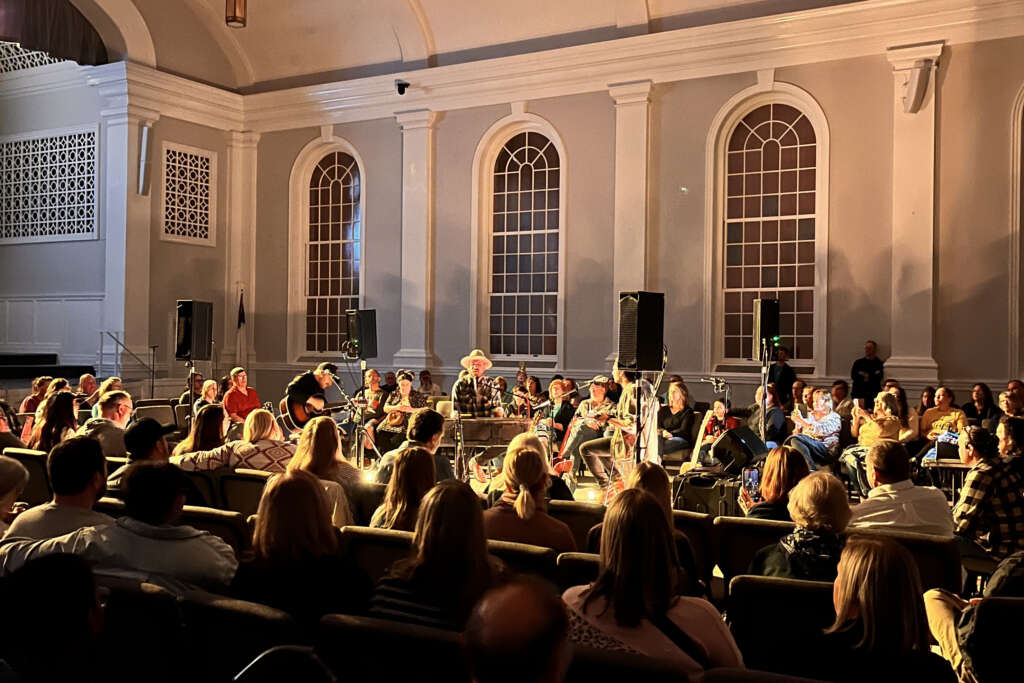 room of people worshipping together at Night of Worship